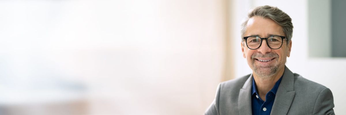 Confident Businessman A confident Niagara businessman not worrying about IT problems.